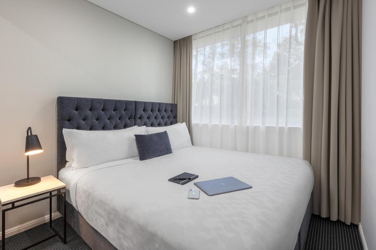 Meriton Suites North Ryde Sydney Exterior photo A bedroom at the hotel