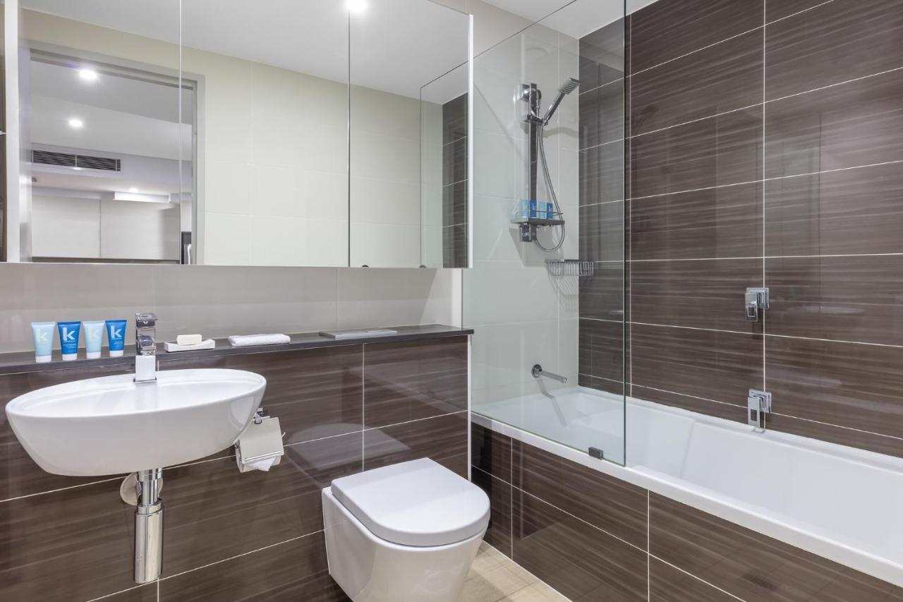 Meriton Suites North Ryde Sydney Exterior photo A typical bathroom in a Premier Inn