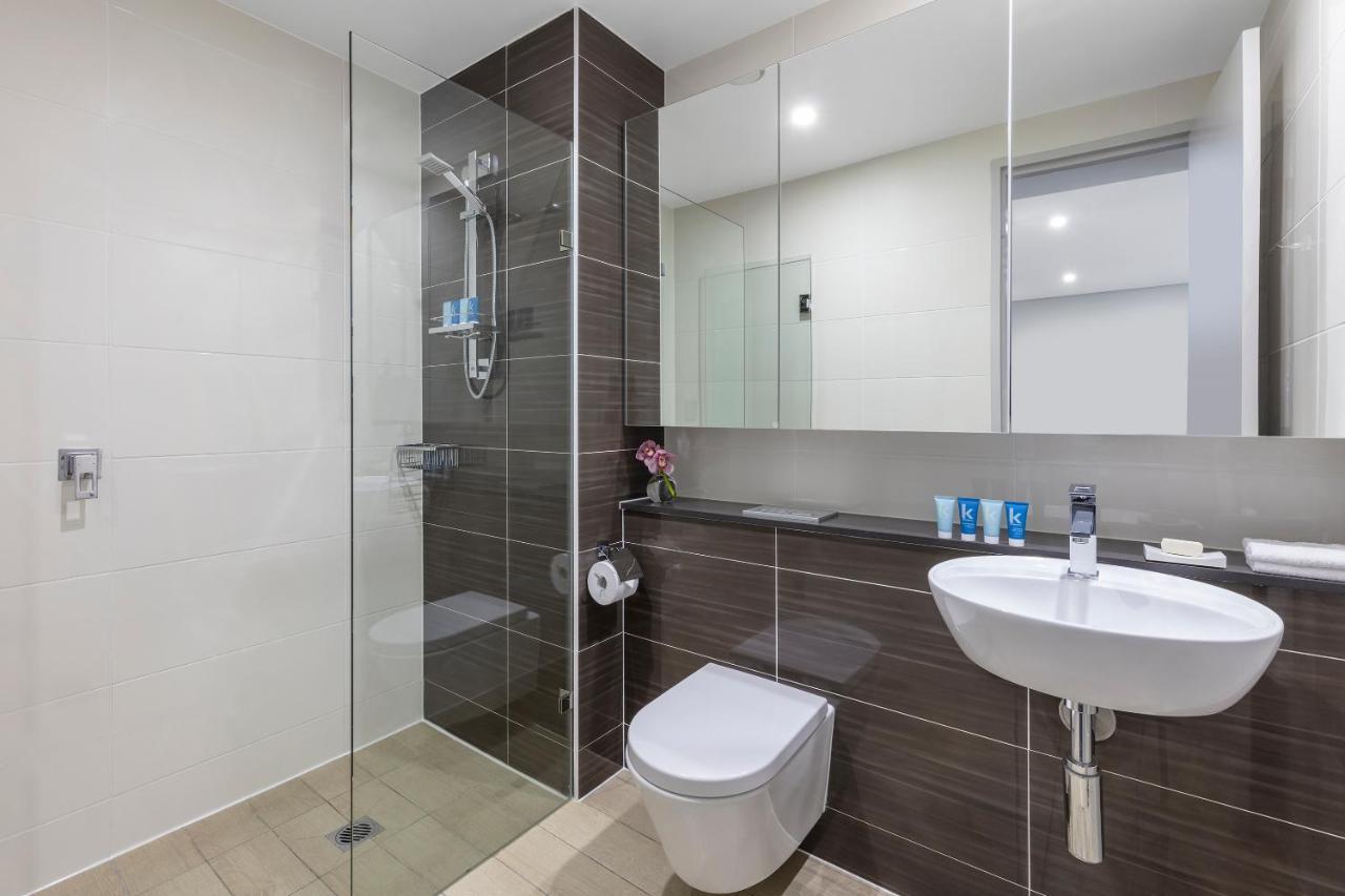 Meriton Suites North Ryde Sydney Exterior photo A modern bathroom