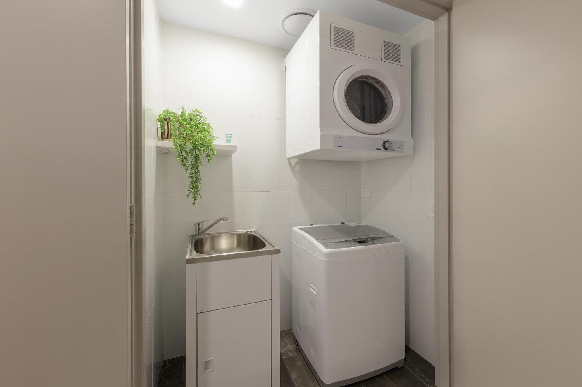 Meriton Suites North Ryde Sydney Exterior photo Laundry room